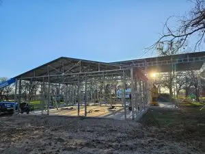 Framing crew welding steel structure in Texas