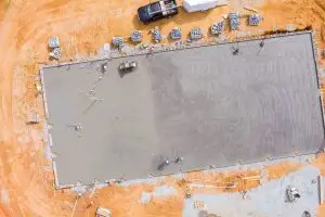 Concrete slab and pier foundation side by side in Texas