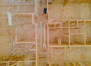 Visual comparison of DIY homeowner vs. professional contractor building a barndominium in Texas.